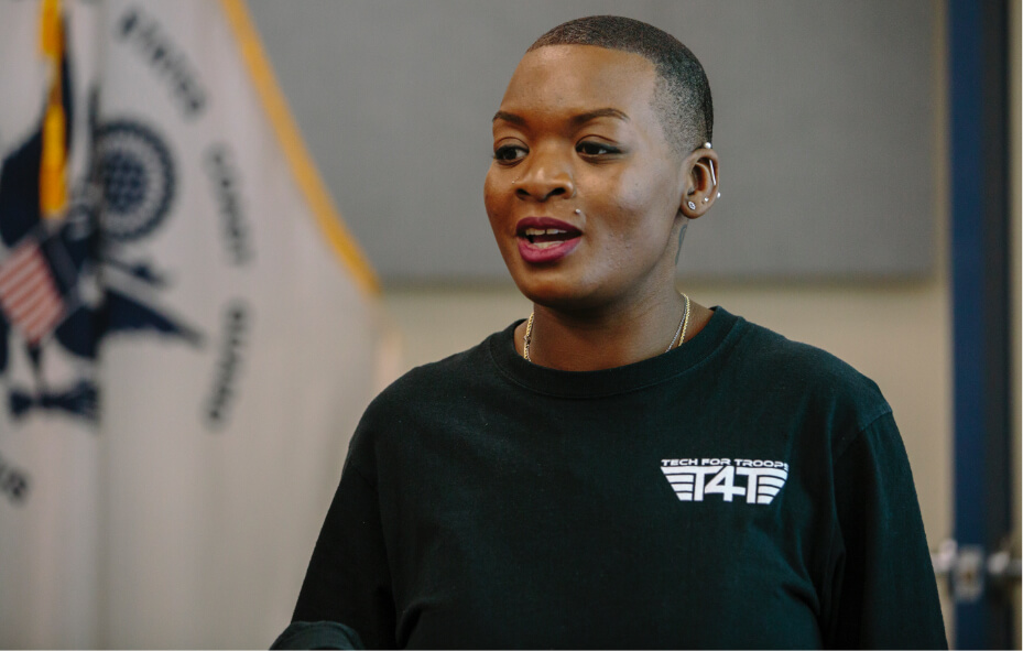 Woman standing giving presentation